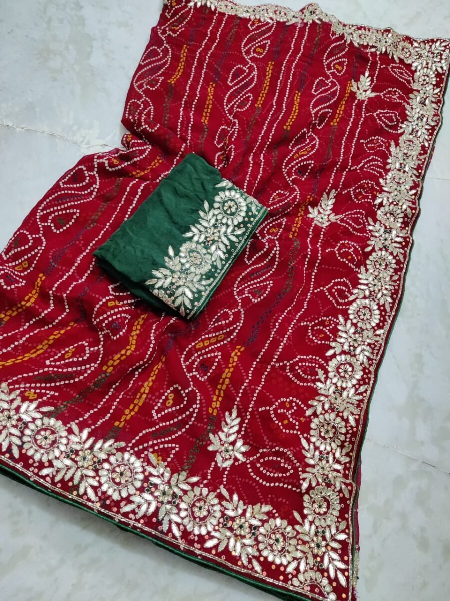 A beautiful red Bandhej saree with intricate Gota Patti border and a contrast green blouse.