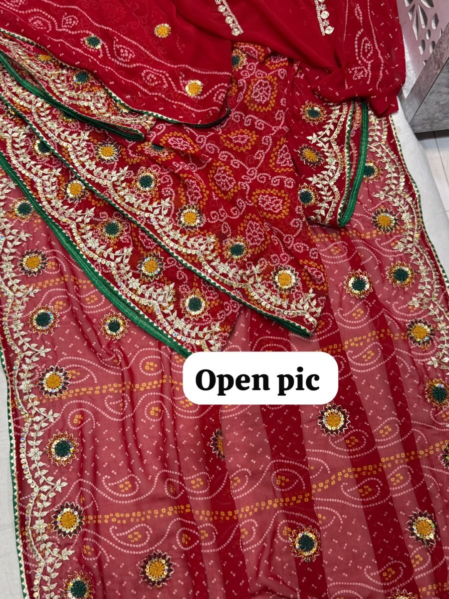A luxurious red georgette Bandhej saree featuring intricate gold Pittan Dori and Resham embroidery along the border.