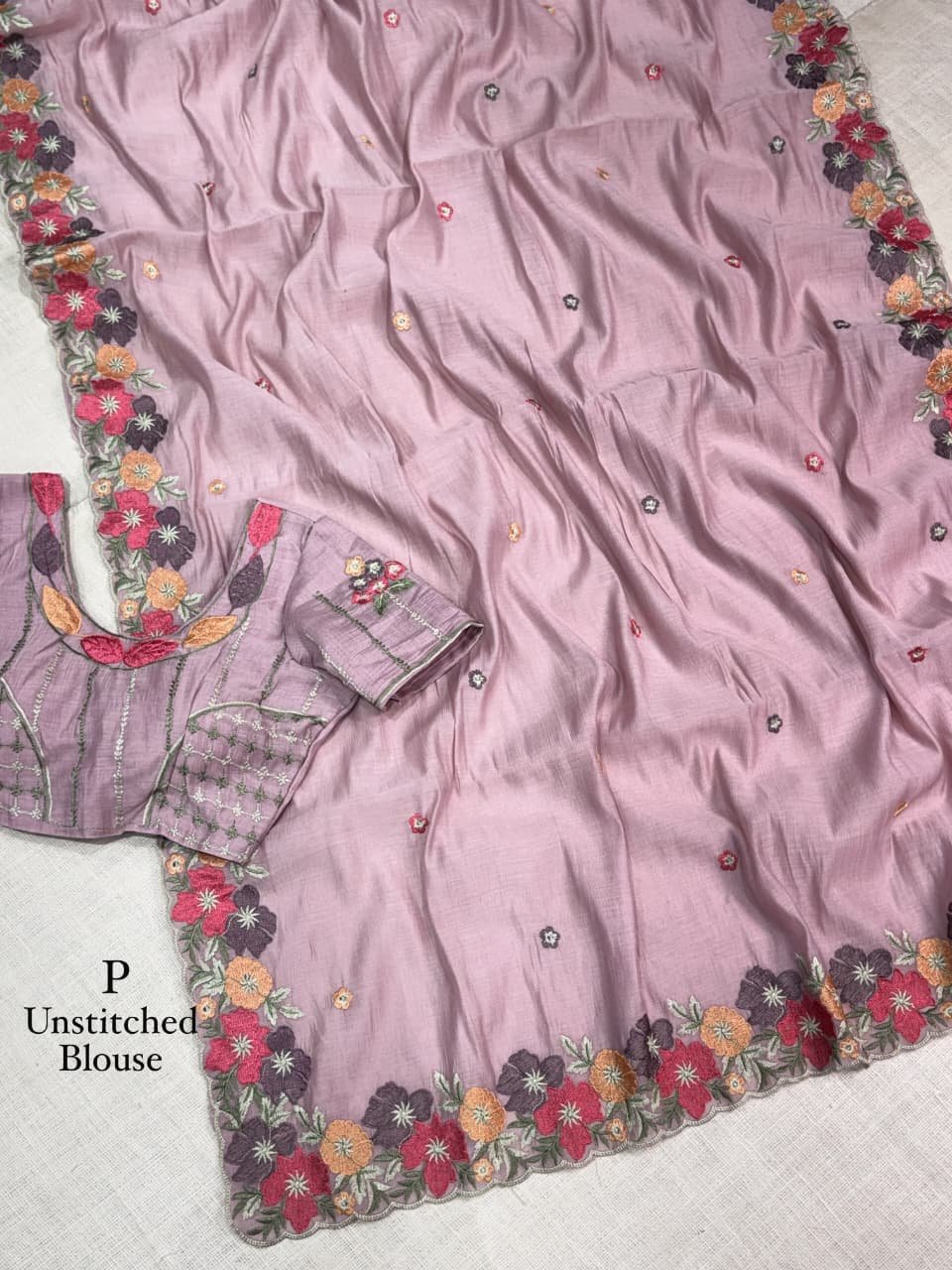 Coral Chiffon Saree with Kashmiri Thread Embroidery 6 A collage showing multiple views of a coral chiffon saree with intricate multi-colored floral embroidery and scalloped border details.