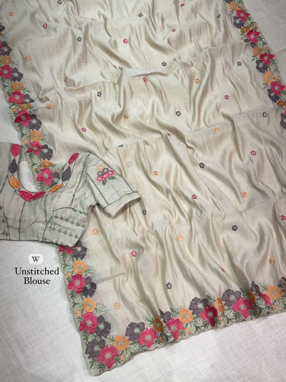 Coral Chiffon Saree with Kashmiri Thread Embroidery 8 A collage showing multiple views of a coral chiffon saree with intricate multi-colored floral embroidery and scalloped border details.