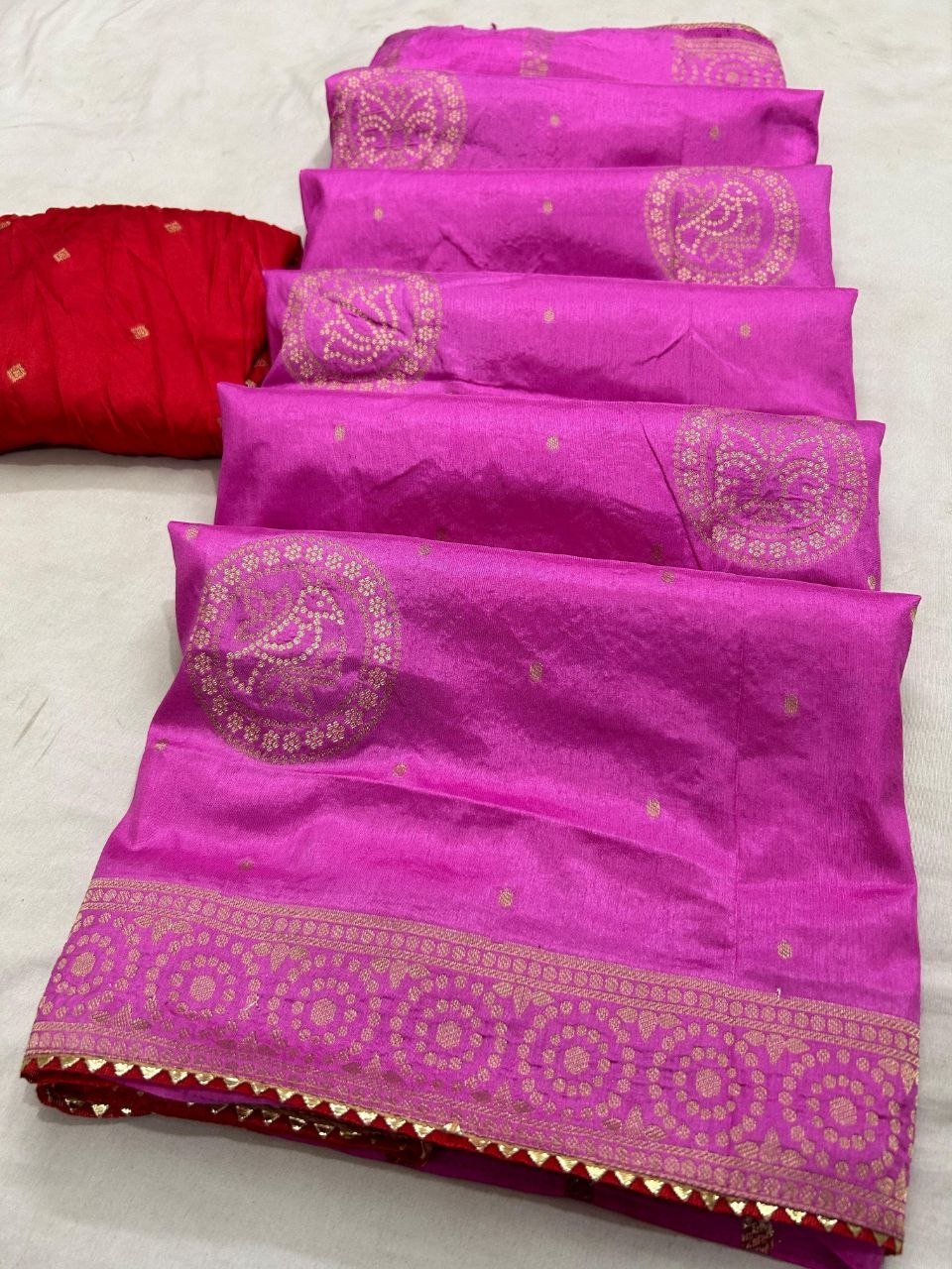 Deep Purple Dola Silk Zari Work Saree | Kanha Saree 3 A flat-lay view of a deep purple Dola silk saree featuring gold zari work and a contrasting red blouse piece.