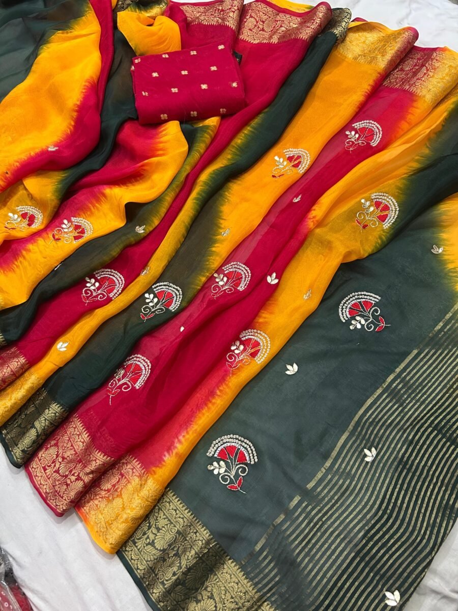 A vibrant multi-colored handwork saree made of Pure H.O. Silk with a traditional Zari border and matching blouse piece.