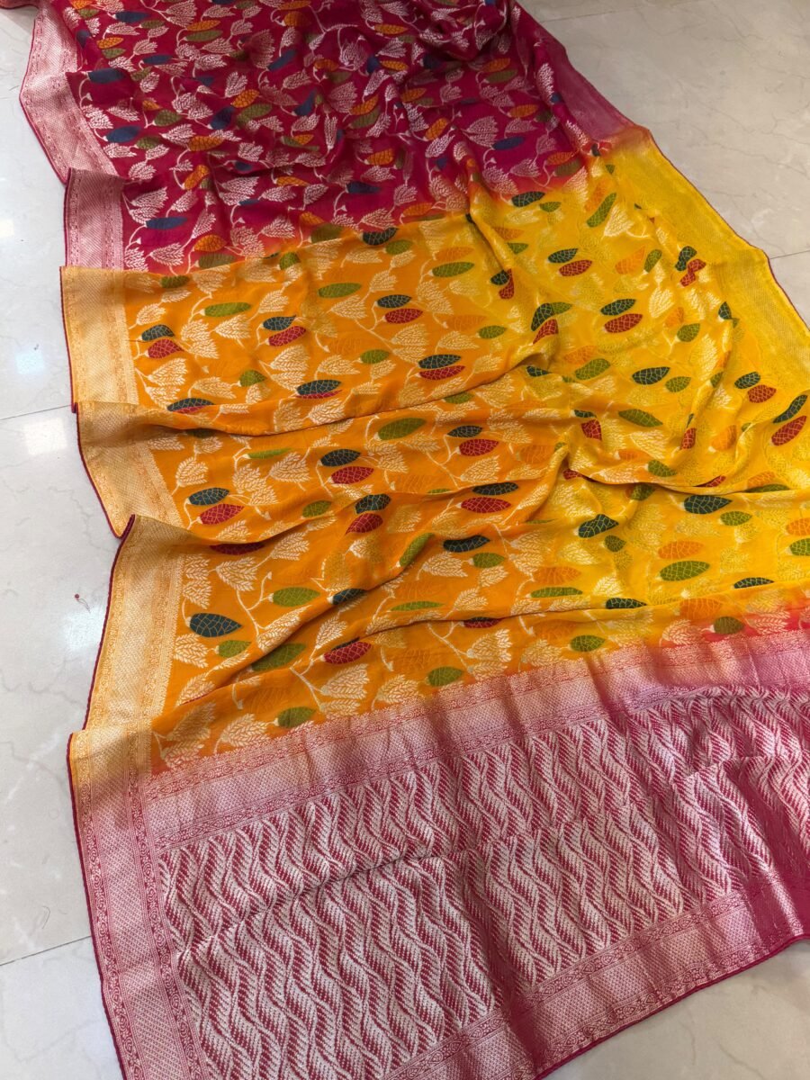 A vibrant yellow and magenta dual-tone Khadi Jorjett saree featuring intricate Meena Zari work and a detailed silver border.
