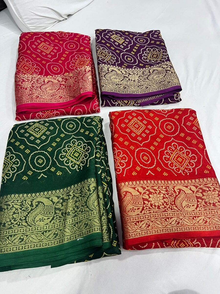 Four folded Marshmallow Bandhani sarees in red, purple, and green colors with detailed gold woven borders.