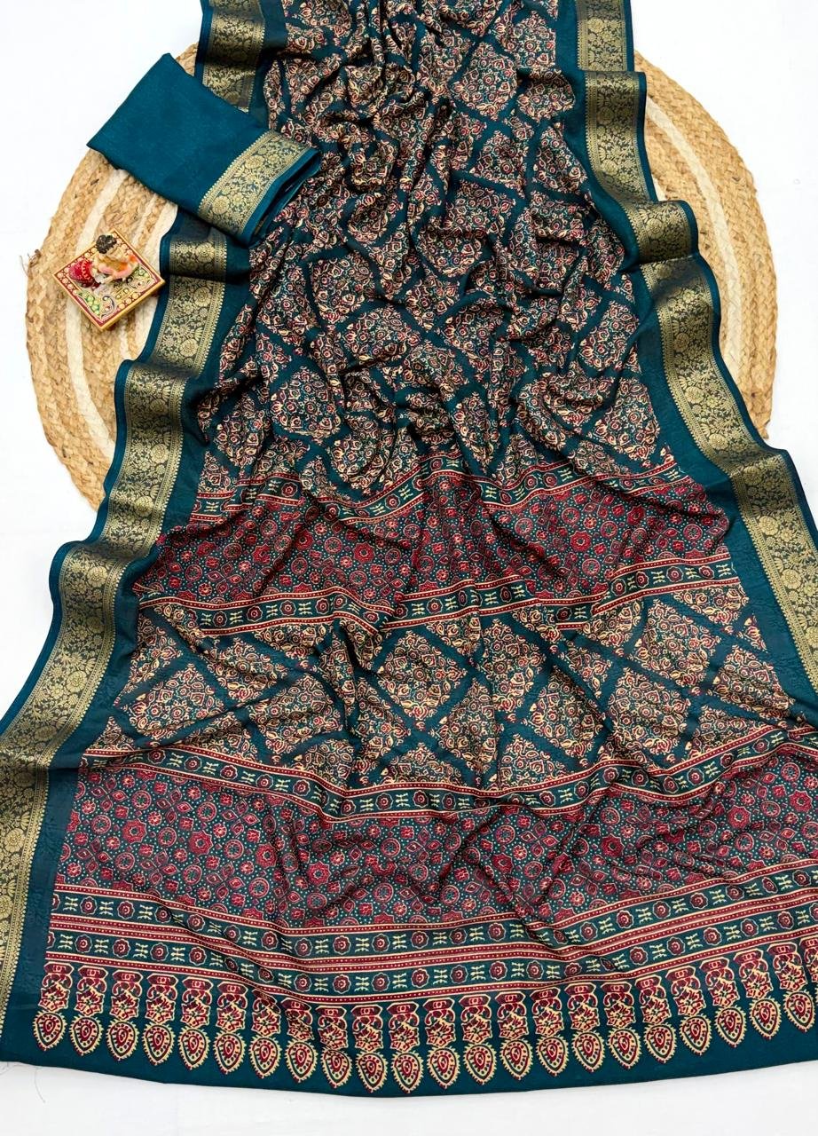 Soft Dola Weaving Saree with Jacquard Border 7 A navy blue Soft Dola weaving saree with an intricate golden jacquard border and a matching blouse piece on a jute mat.