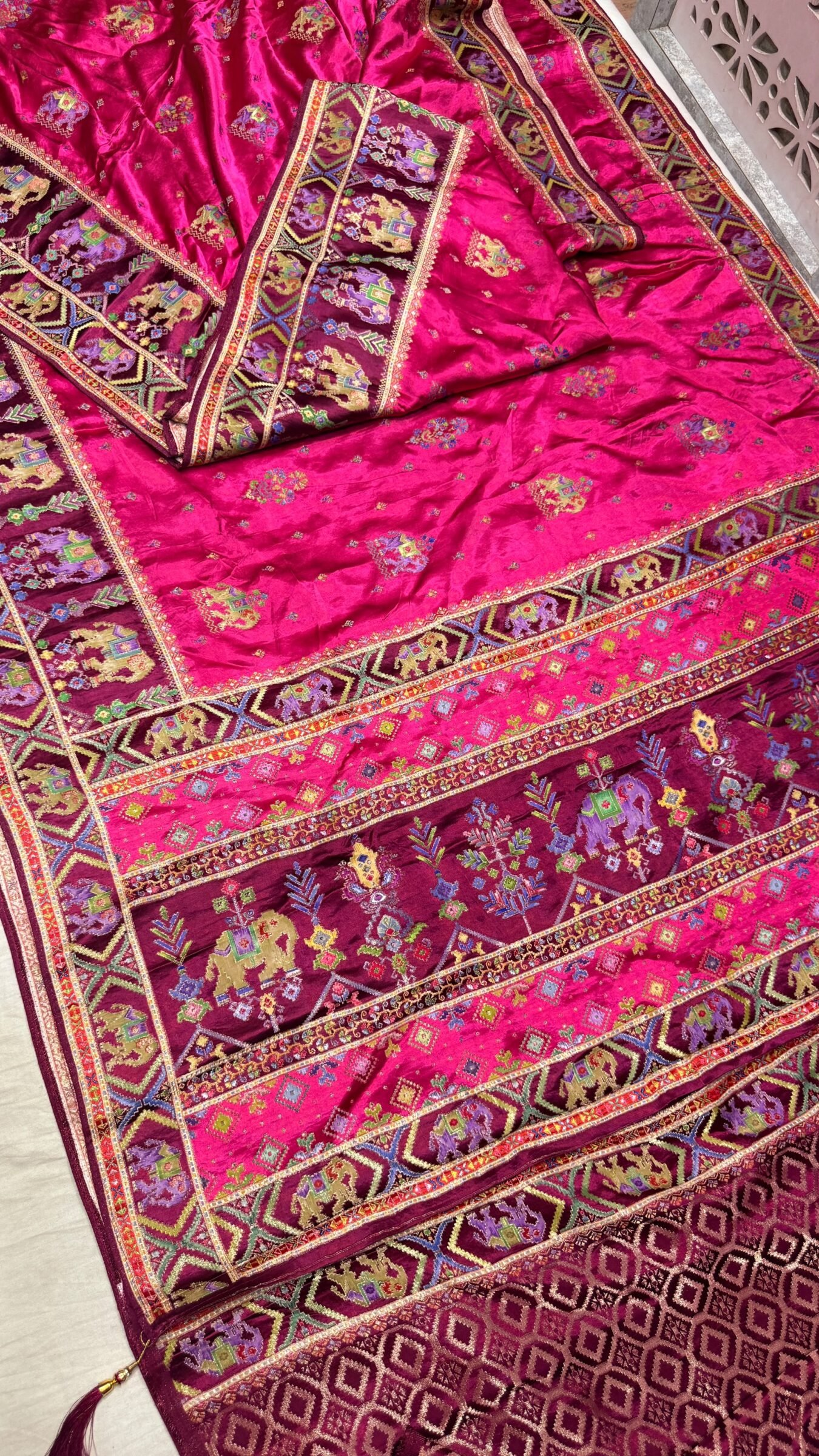 Royal Raj Darbari Tissue Silk Saree with Zari Work 3 A beautiful teal tissue silk saree featuring intricate golden zari work, traditional raj darbari motifs, and a matching embroidered blouse.