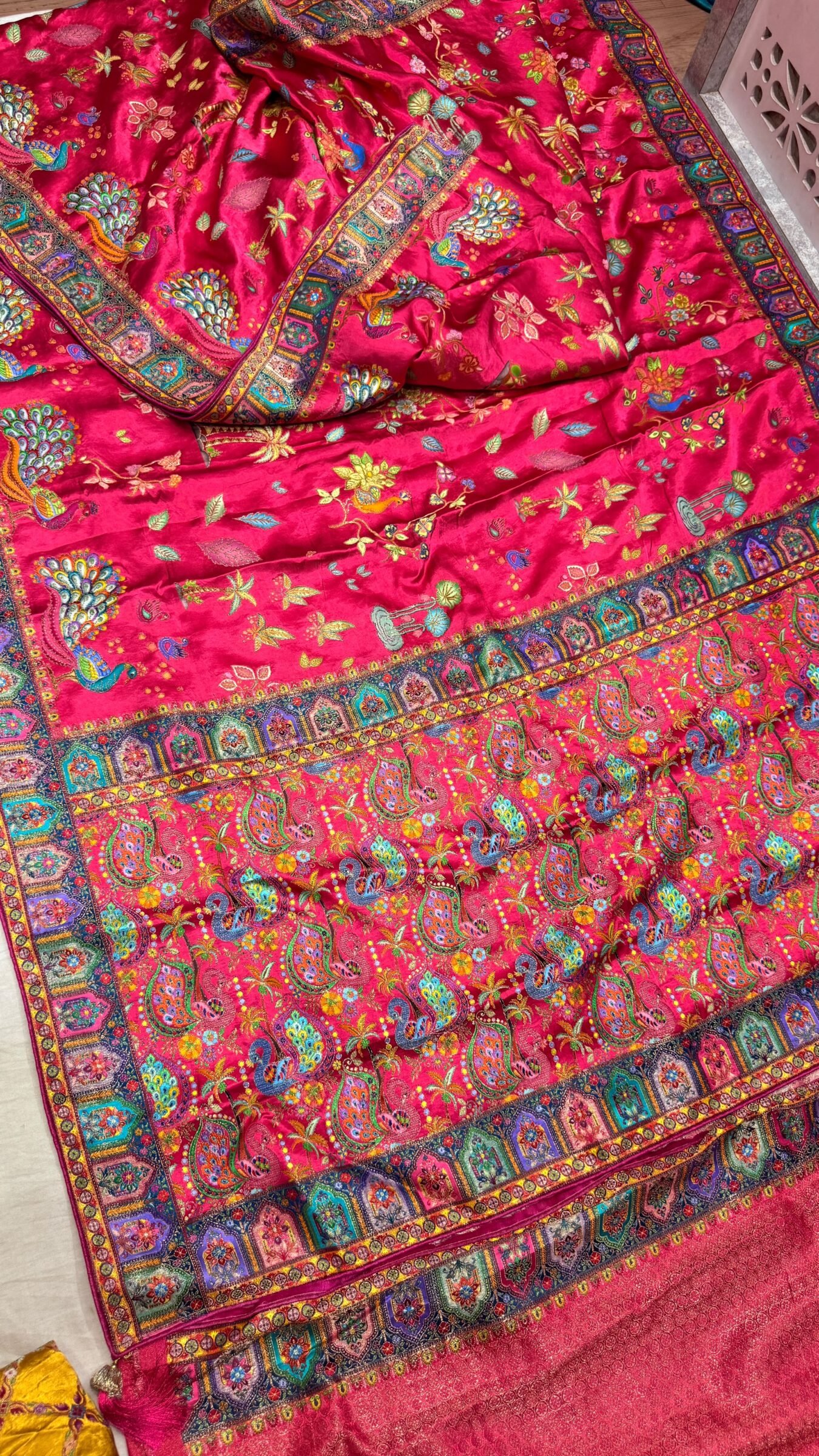 Royal Raj Darbari Tissue Silk Saree with Zari Work 4 A beautiful teal tissue silk saree featuring intricate golden zari work, traditional raj darbari motifs, and a matching embroidered blouse.