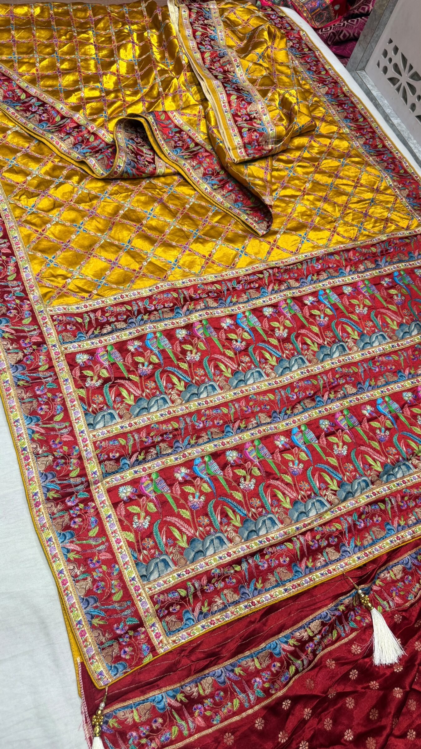 Royal Raj Darbari Tissue Silk Saree with Zari Work 6 A beautiful teal tissue silk saree featuring intricate golden zari work, traditional raj darbari motifs, and a matching embroidered blouse.