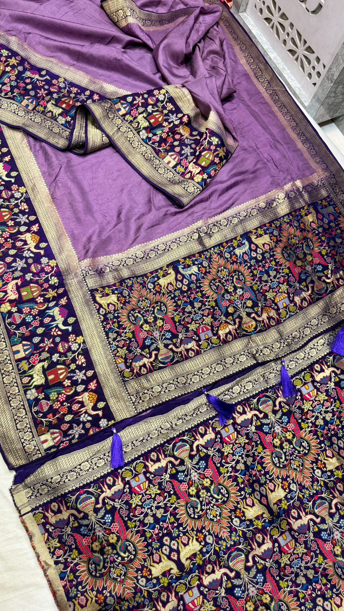 Royal Raj Darbari Tissue Silk Saree with Zari Work 7 A beautiful teal tissue silk saree featuring intricate golden zari work, traditional raj darbari motifs, and a matching embroidered blouse.