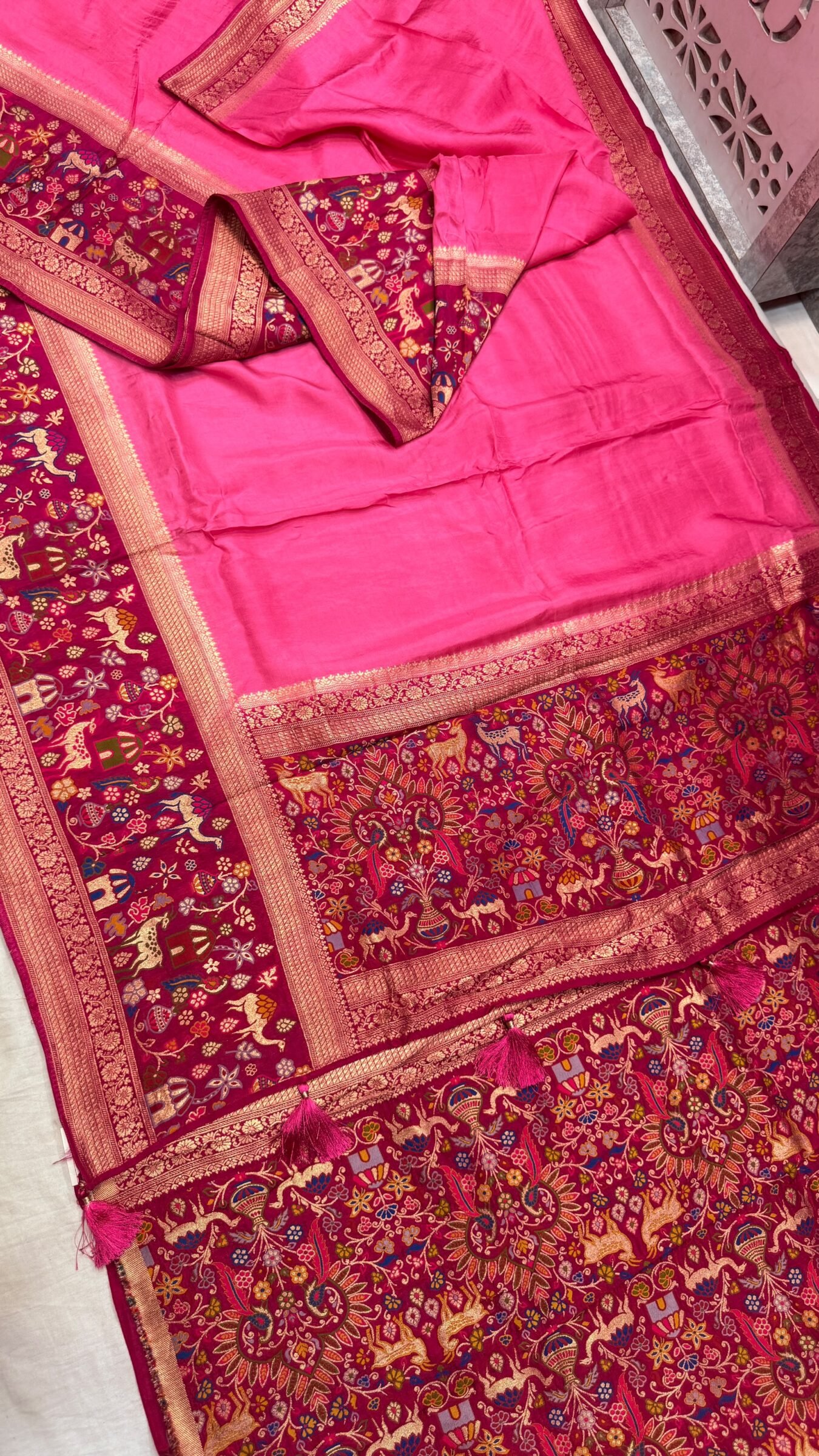 Royal Raj Darbari Tissue Silk Saree with Zari Work 9 A beautiful teal tissue silk saree featuring intricate golden zari work, traditional raj darbari motifs, and a matching embroidered blouse.