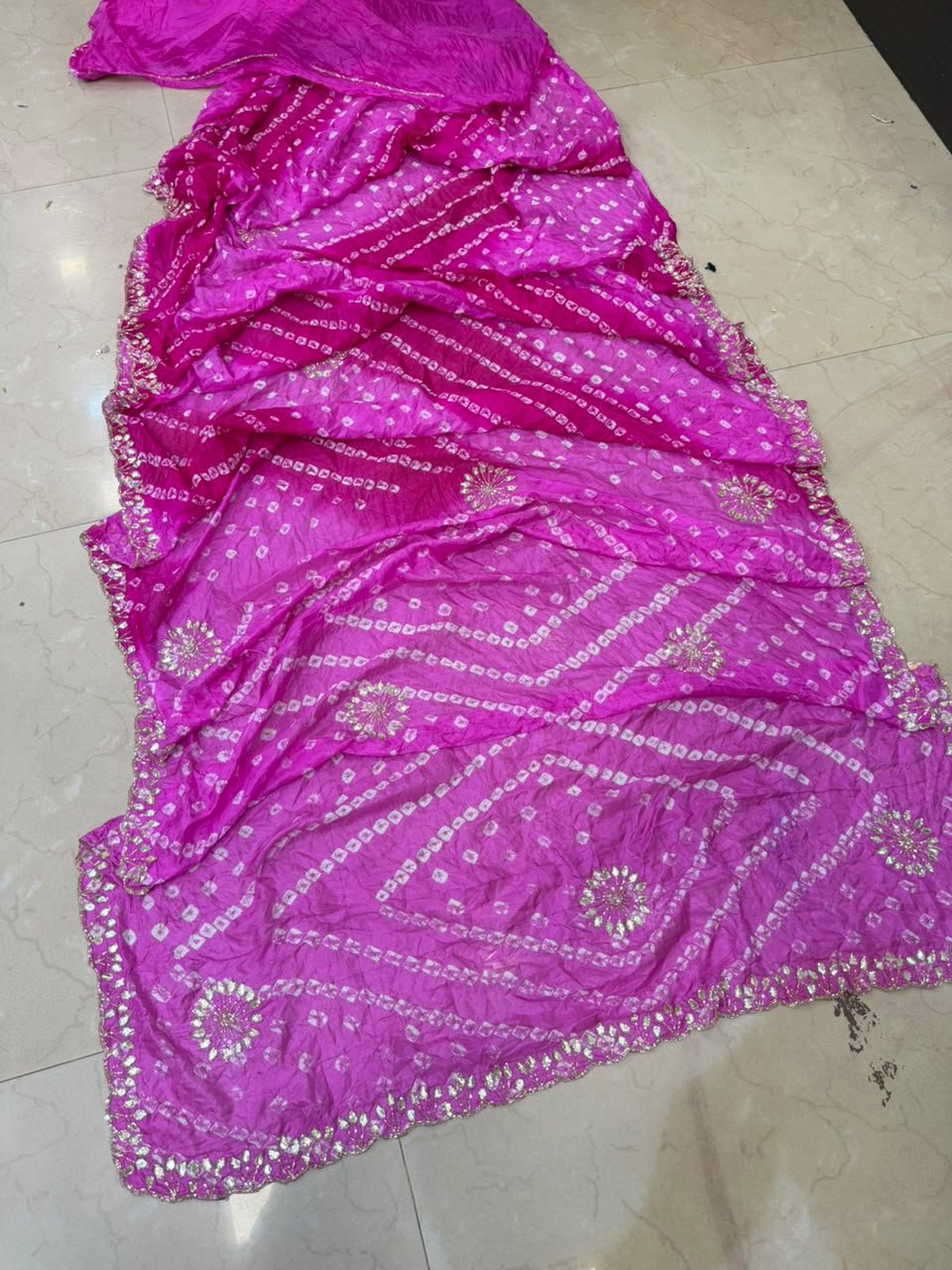 Semi Silk Bandhej Saree with Gota Patti and Katdana Work 6 A beautiful semi silk Bandhej saree in shades of green and blue, featuring intricate Gota Patti and Katdana handwork throughout the fabric.