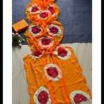 A collection of five colorful chiffon sarees with Ladoo print circles and handwork details.