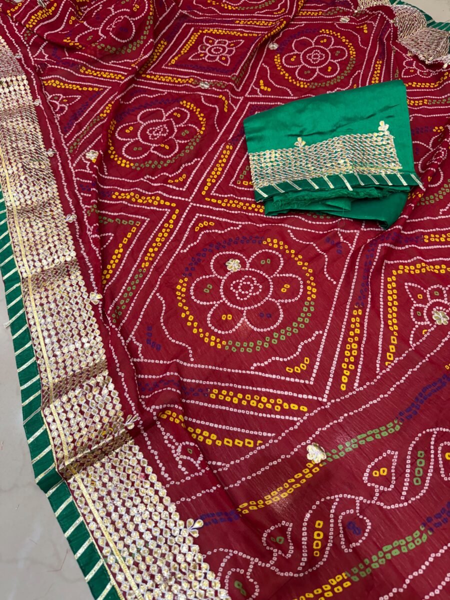 A beautiful Chunari Saree in Micro Jeorget moss fabric with detailed hand Gota Patti work along the border.