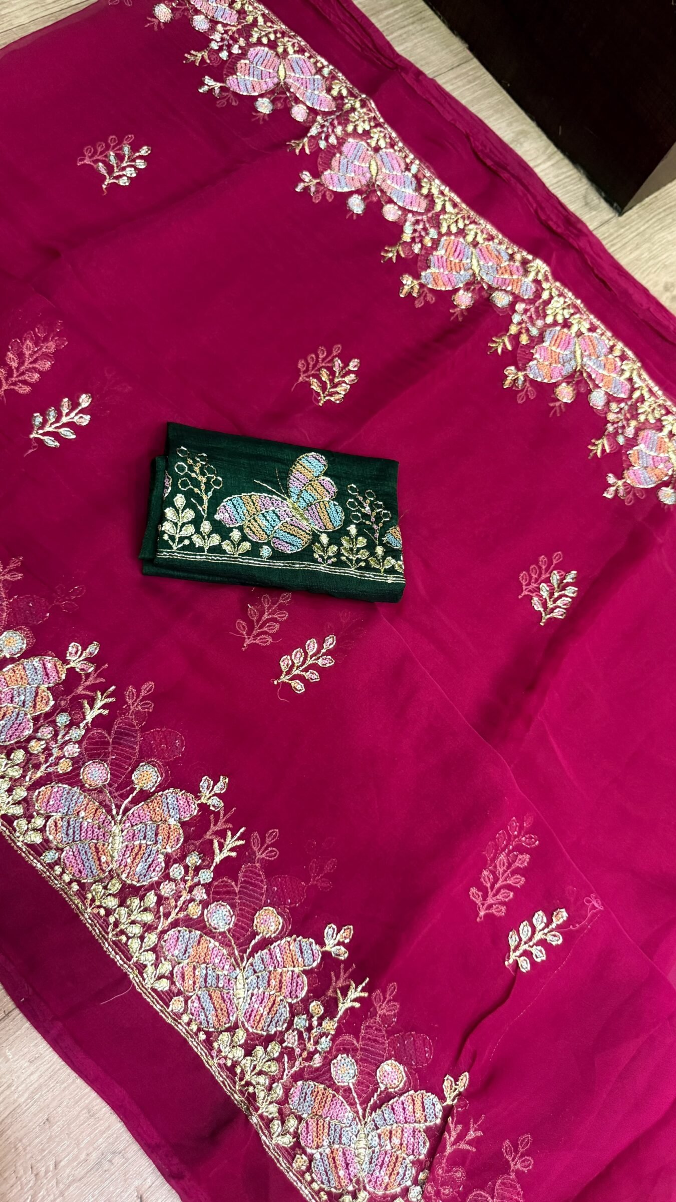 Royal Georgette Darbari Saree with Kardana Work 3 A beautiful collection of Royal Georgette Darbari sarees in various vibrant colors, featuring detailed butterfly kardana work and elegant borders.