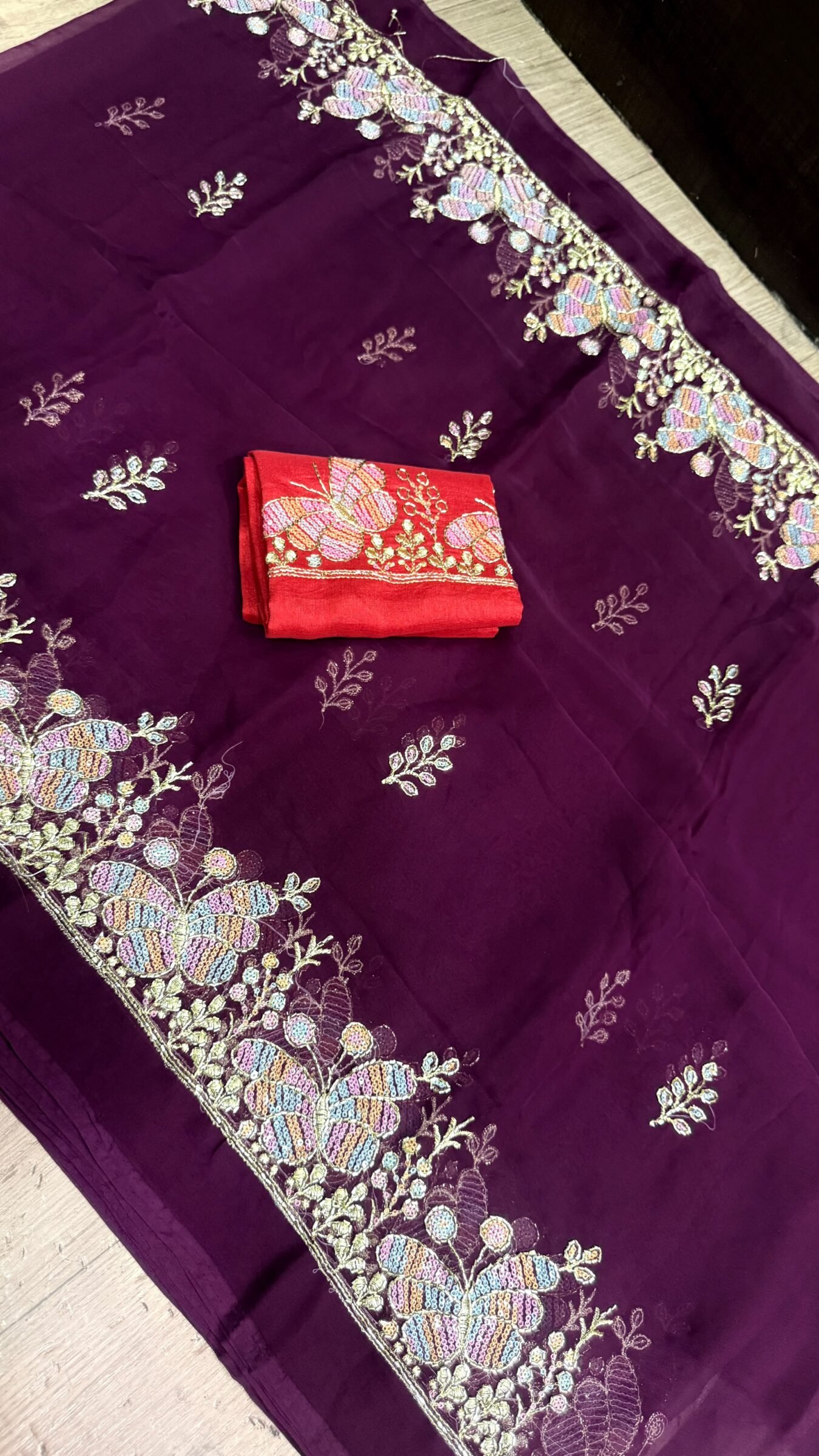 Royal Georgette Darbari Saree with Kardana Work 4 A beautiful collection of Royal Georgette Darbari sarees in various vibrant colors, featuring detailed butterfly kardana work and elegant borders.
