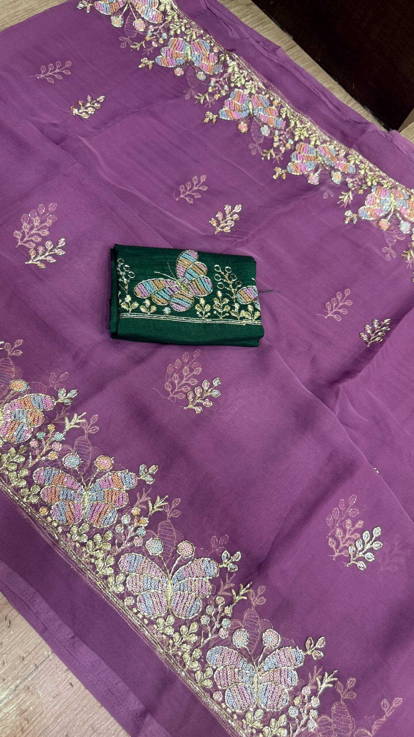 Royal Georgette Darbari Saree with Kardana Work 5 A beautiful collection of Royal Georgette Darbari sarees in various vibrant colors, featuring detailed butterfly kardana work and elegant borders.