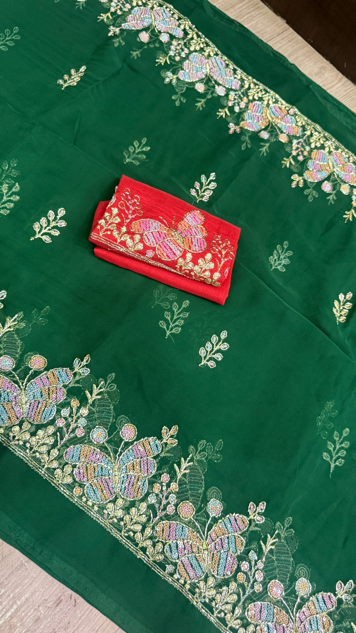 Royal Georgette Darbari Saree with Kardana Work 6 A beautiful collection of Royal Georgette Darbari sarees in various vibrant colors, featuring detailed butterfly kardana work and elegant borders.