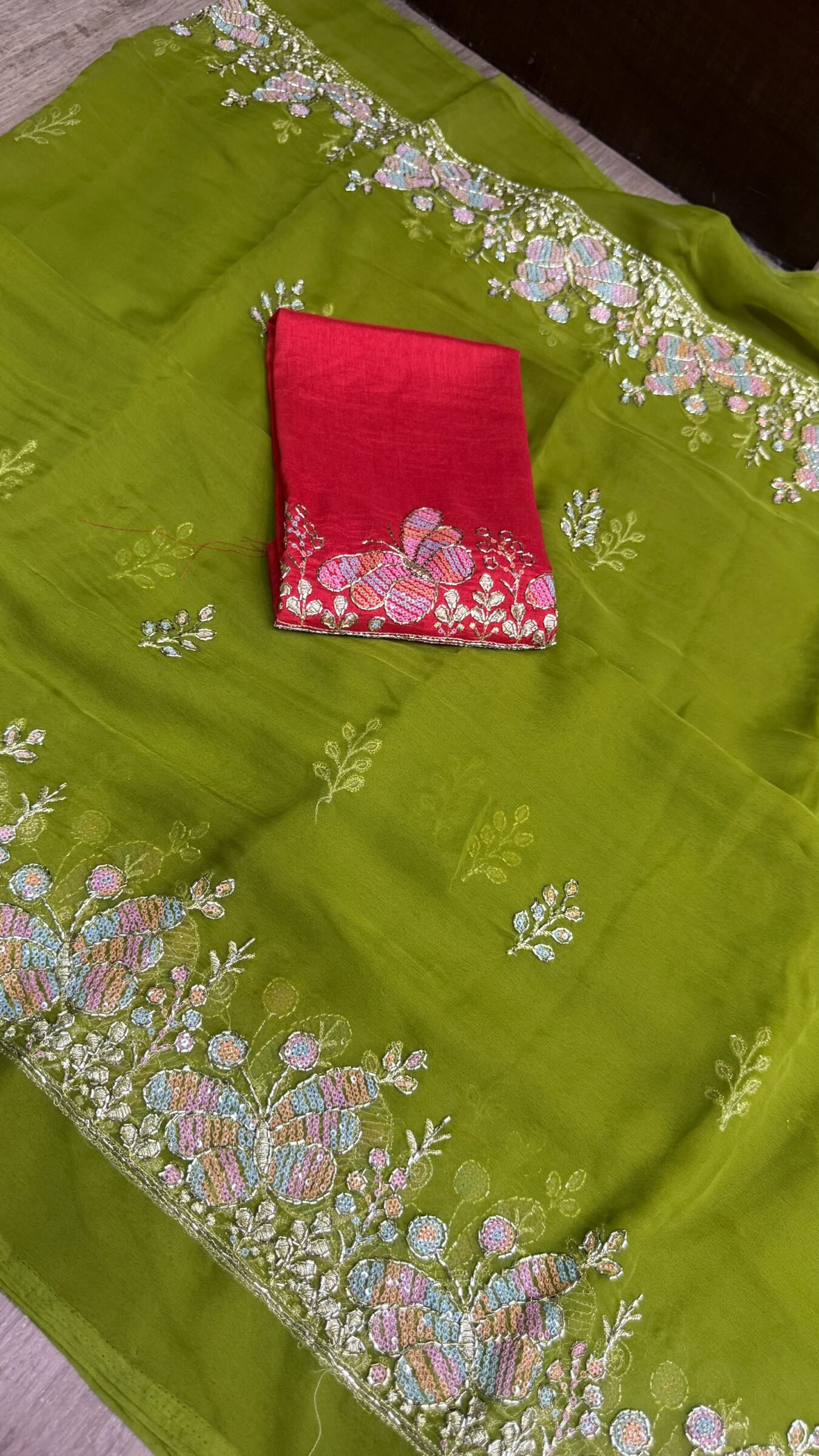 Royal Georgette Darbari Saree with Kardana Work 7 A beautiful collection of Royal Georgette Darbari sarees in various vibrant colors, featuring detailed butterfly kardana work and elegant borders.