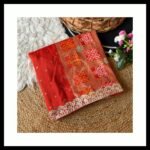 Four folded Dola Viscose Bandhej sarees in vibrant colours featuring intricate Gota Patti borders and rich weaving.