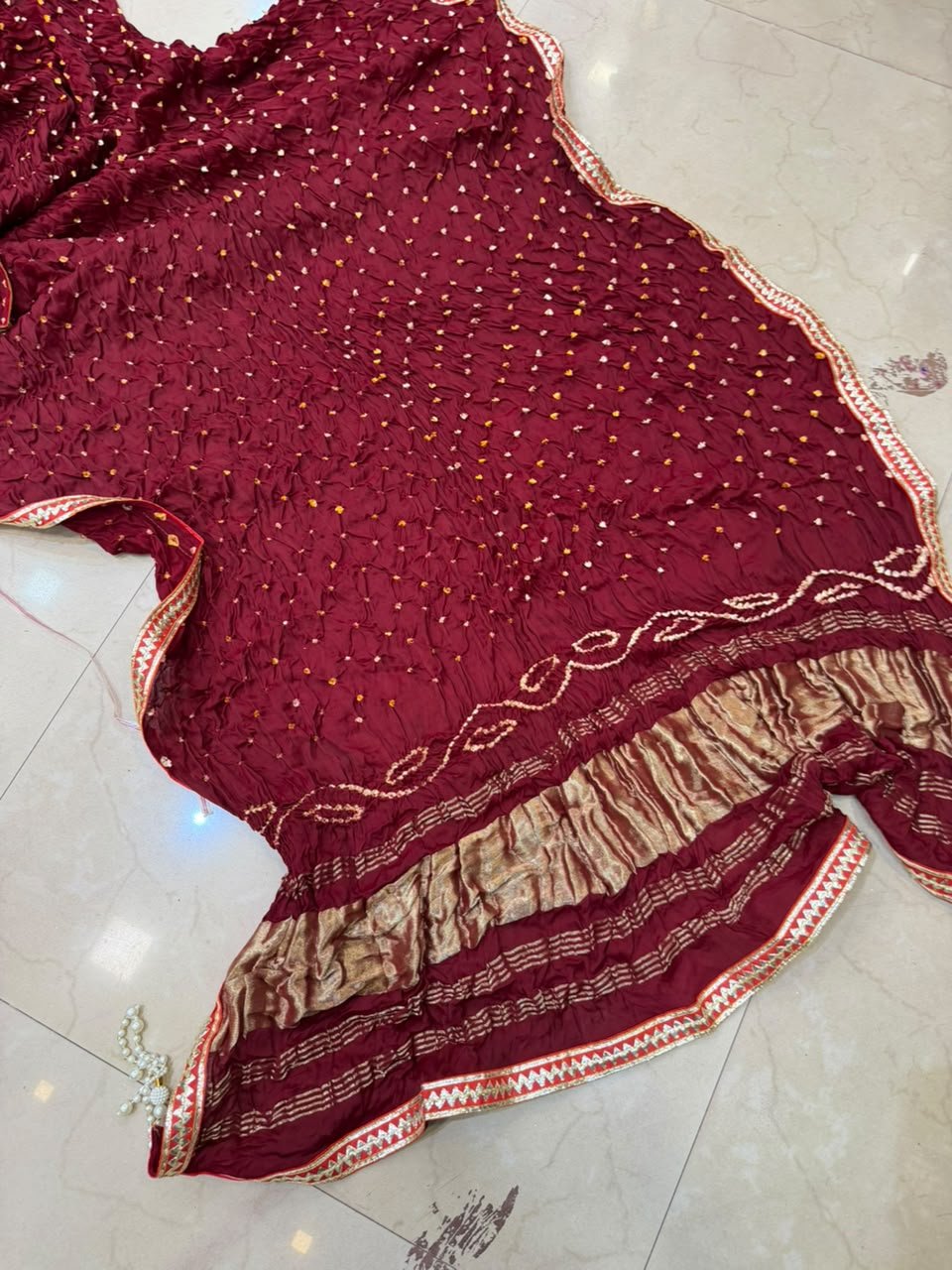 Bandhej Dupatta, Pure Gajji Silk Handwork Dupatta 2 Three colorful Bandhej dupattas with Gota Patti borders and tassels displayed on a light surface.
