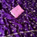 A vibrant purple moss chiffon saree featuring gold gota patti jaal work and a scalloped cutwork border.