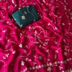 A vibrant purple moss chiffon saree featuring gold gota patti jaal work and a scalloped cutwork border.