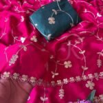 A vibrant purple moss chiffon saree featuring gold gota patti jaal work and a scalloped cutwork border.