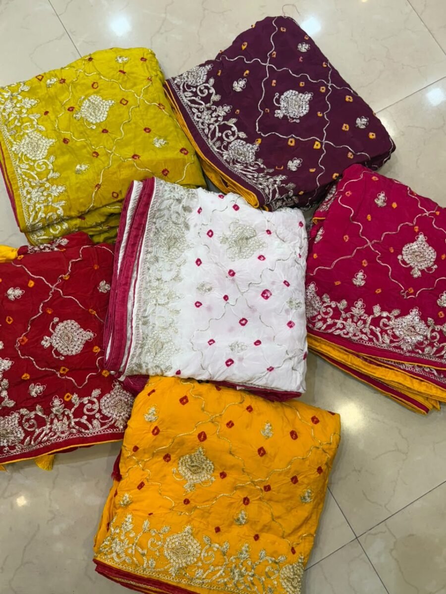 A collection of beautiful Pure Ho silk sarees in vibrant colors featuring hand Bandhani work and intricate heavy embroidery.