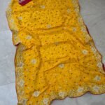A collection of beautiful Pure Ho silk sarees in vibrant colors featuring hand Bandhani work and intricate heavy embroidery.