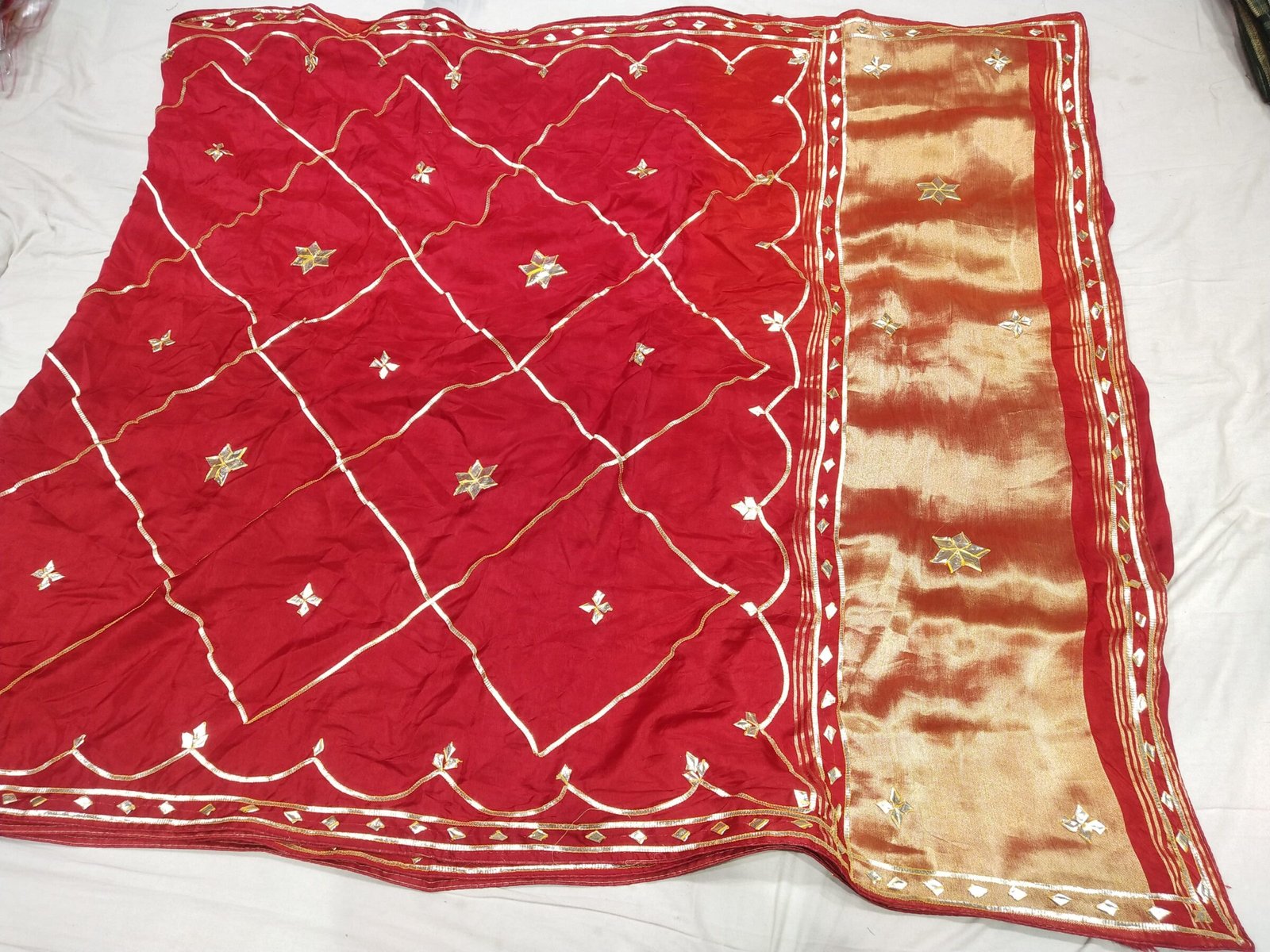 Jaipuri Gota Patti Saree in Pure Rasiyan Silk 6 A vibrant pink and orange Jaipuri silk saree with gold gota patti diamond patterns and a rich golden border.