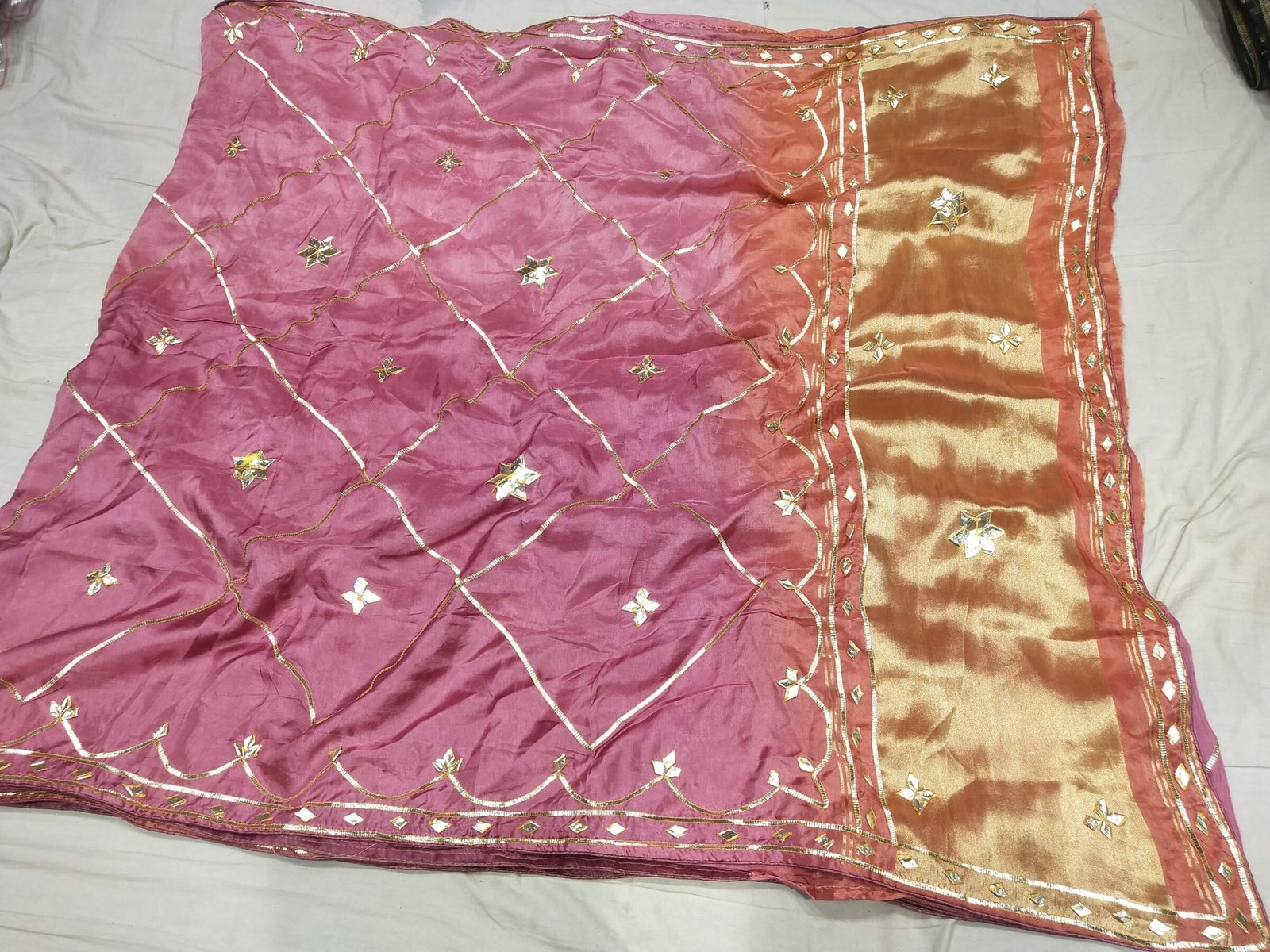 Jaipuri Gota Patti Saree in Pure Rasiyan Silk 7 A vibrant pink and orange Jaipuri silk saree with gold gota patti diamond patterns and a rich golden border.