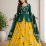 A woman posing in a blue and sky blue tie-dye pattern Chinon silk lehenga set with intricate Gota Patti handwork on a peplum blouse.