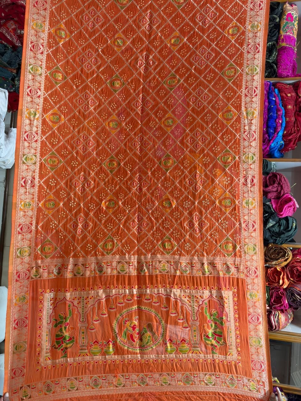 Pure Handloom Khadi Silk Neemjari Bandhej Saree 6 A beautiful deep pink pure Khadi Silk saree featuring intricate Bandhej patterns and detailed gold Neemjari border work.
