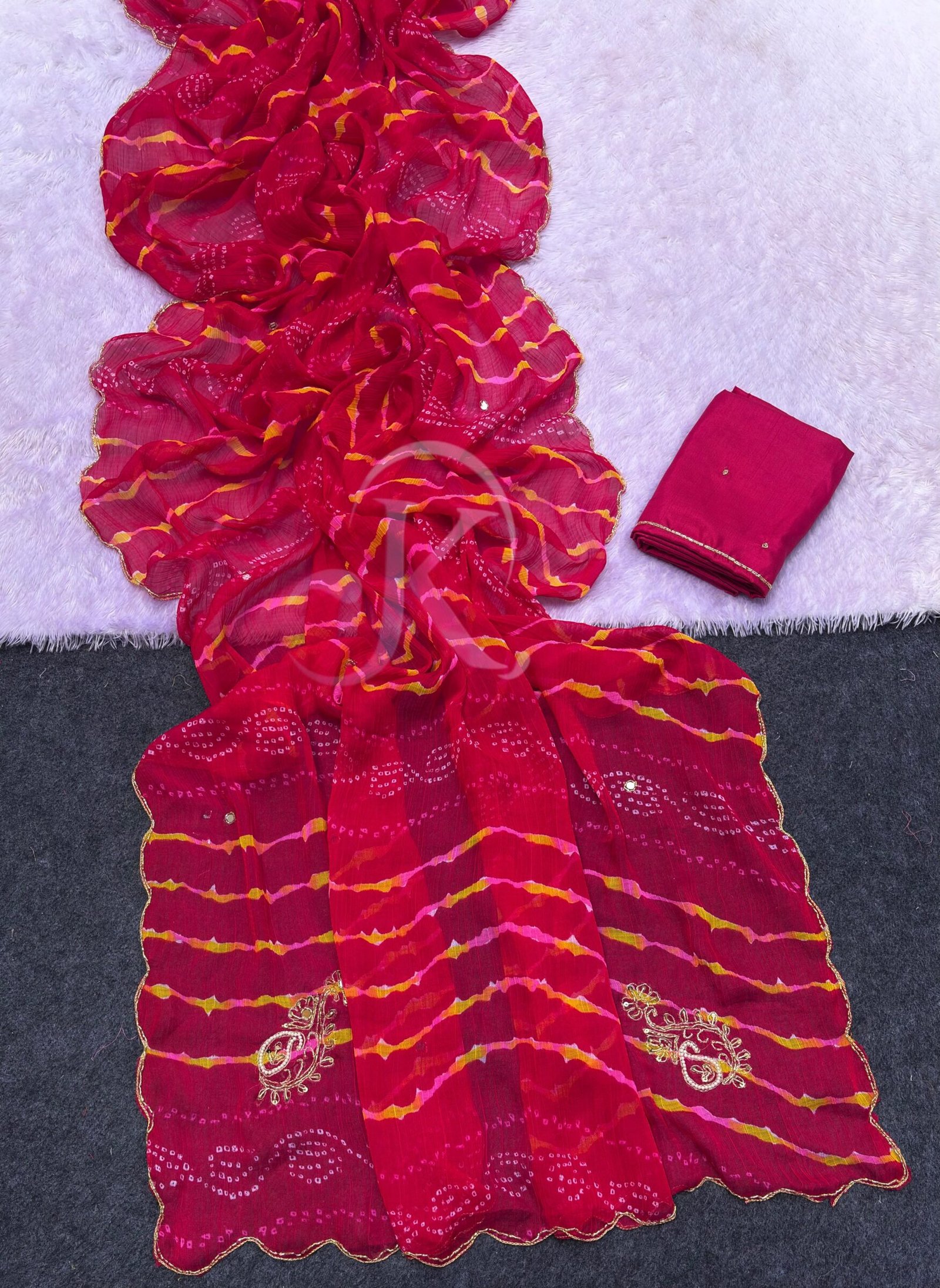 Designer Leheriya Chiffon Saree with Handwork 4 A collection of beautiful Leheriya Chiffon sarees in vibrant colours with intricate gold handwork and borders.
