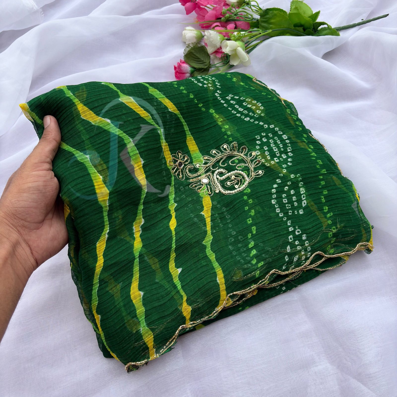 Designer Leheriya Chiffon Saree with Handwork 8 A collection of beautiful Leheriya Chiffon sarees in vibrant colours with intricate gold handwork and borders.