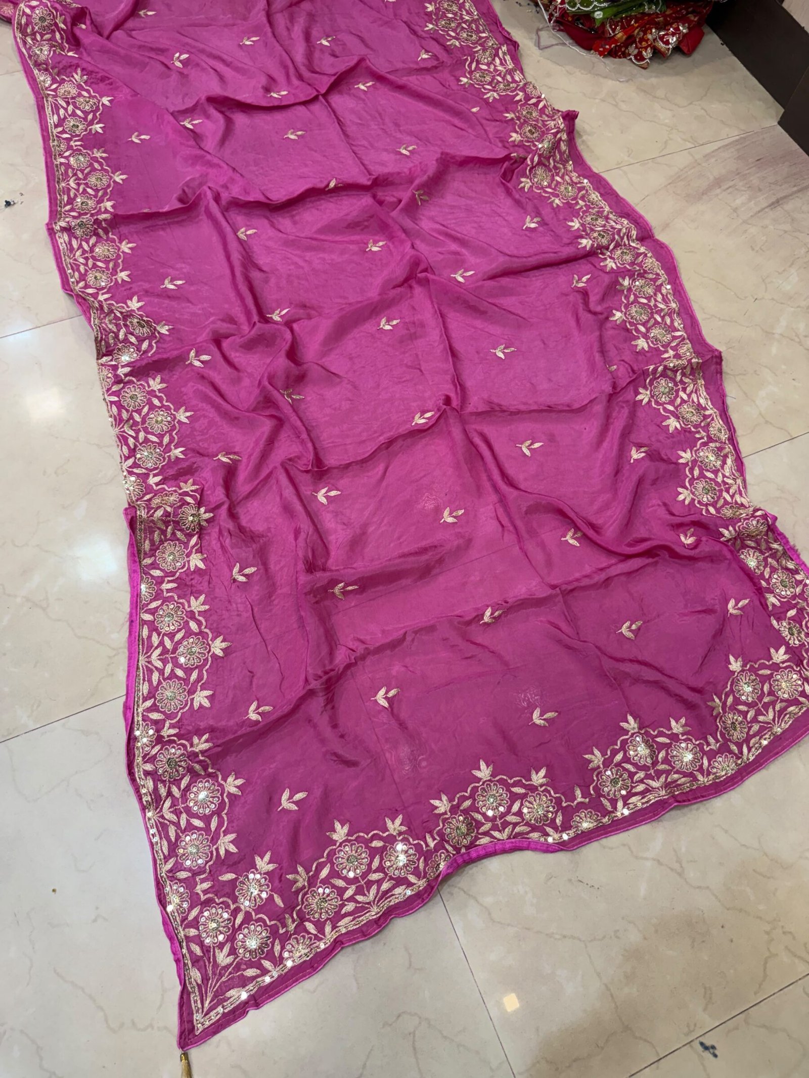 Pure Ho Silk Saree with Elegant Handwork | Kanha Saree 3 A beautiful purple Pure Ho silk saree adorned with delicate gold handwork embroidery along the borders and on the body.