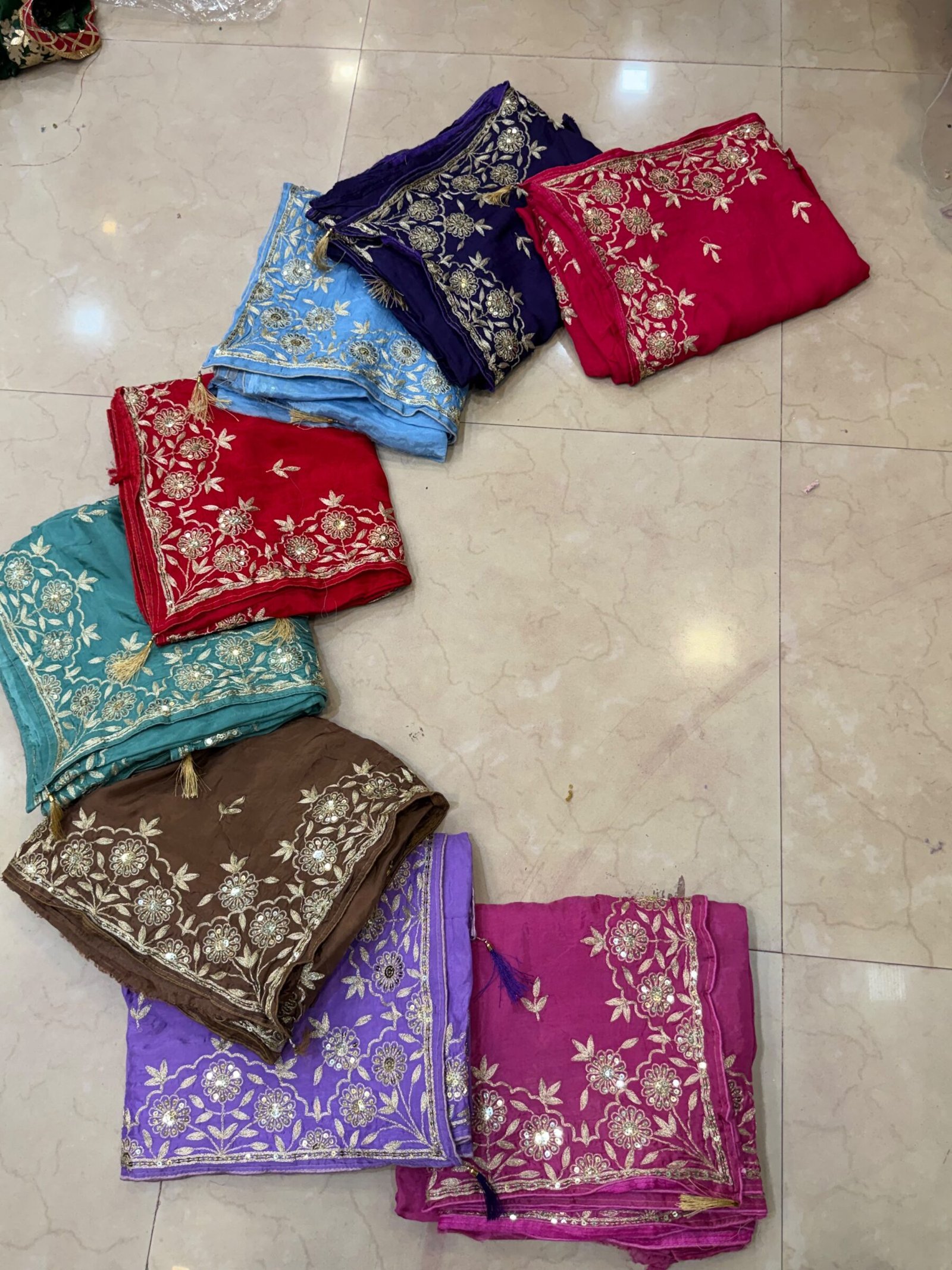Pure Ho Silk Saree with Elegant Handwork | Kanha Saree 8 A beautiful purple Pure Ho silk saree adorned with delicate gold handwork embroidery along the borders and on the body.