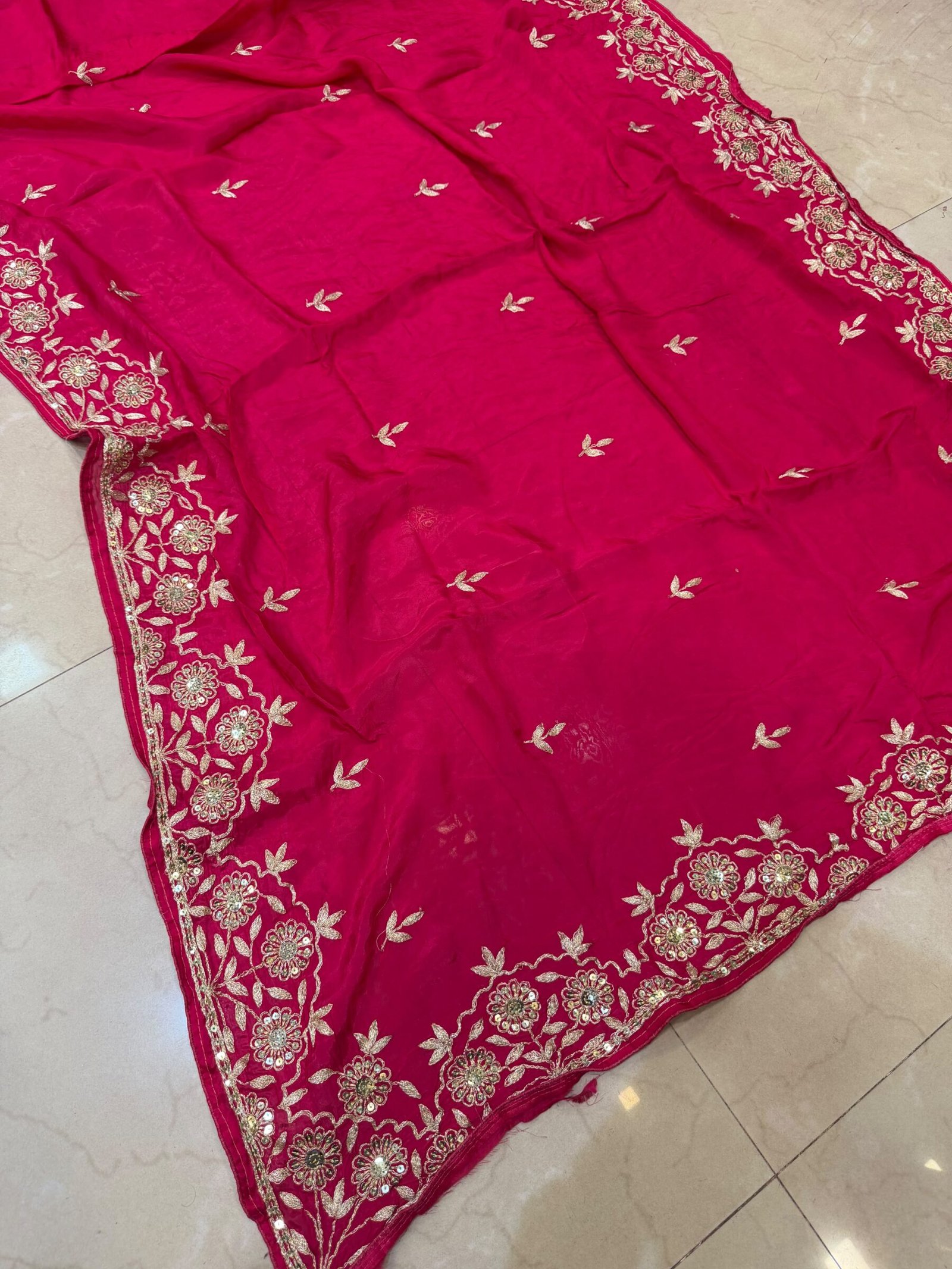 Pure Ho Silk Saree with Elegant Handwork | Kanha Saree 9 A beautiful purple Pure Ho silk saree adorned with delicate gold handwork embroidery along the borders and on the body.