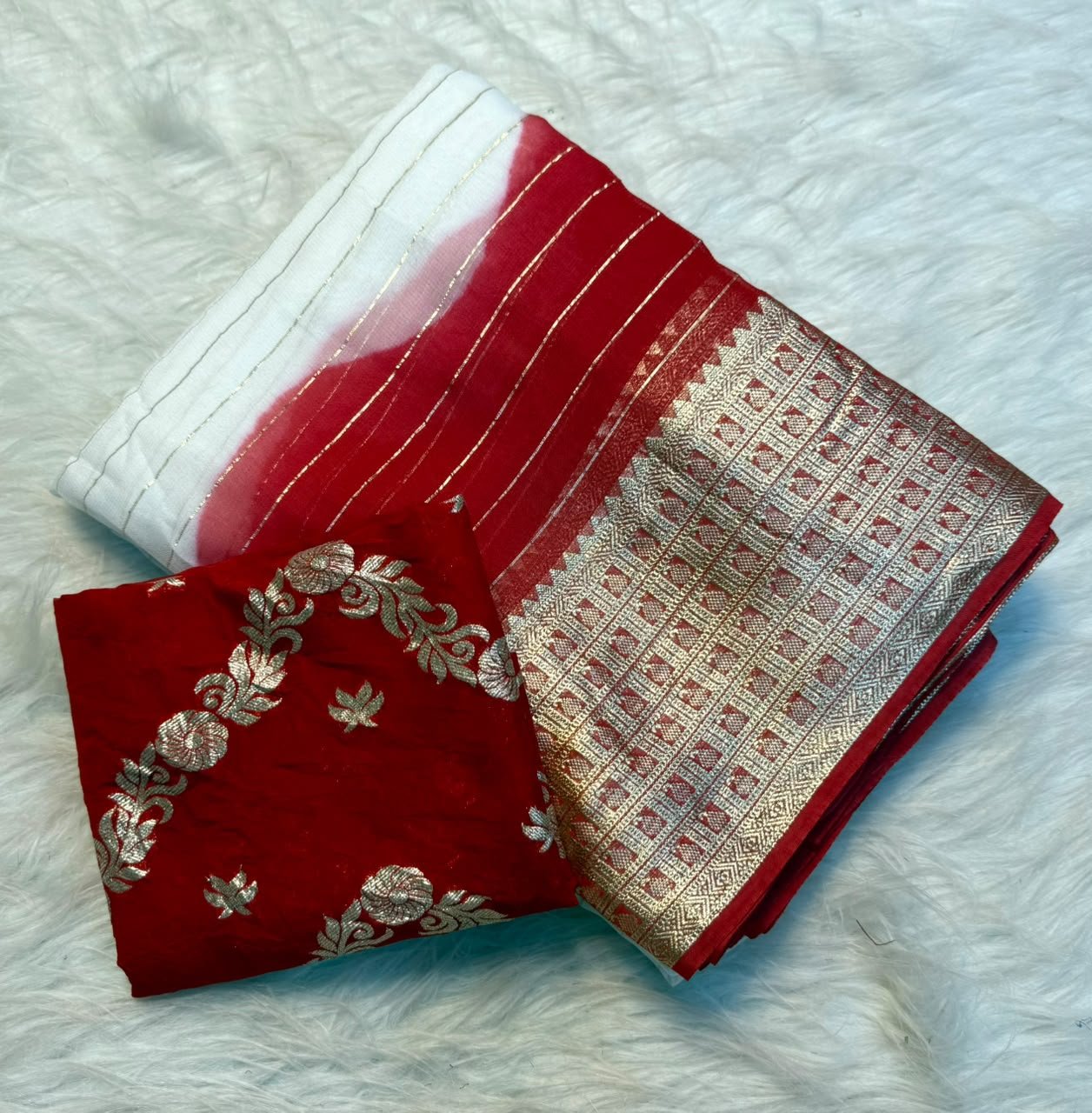Pure Viscose Georgette Saree for Durga Pooja 3 A white and red dual-tone Pure Viscose Georgette saree with golden zari stripes and a wide traditional jacquard border, displayed with a matching red embroidered blouse.